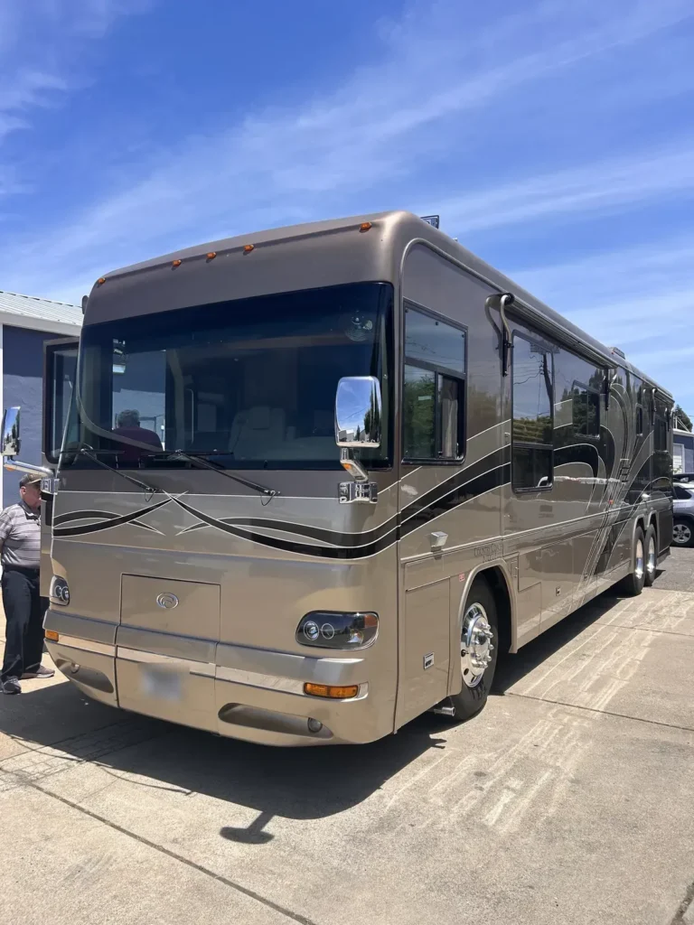 Class A motorhome parked after RV glass service