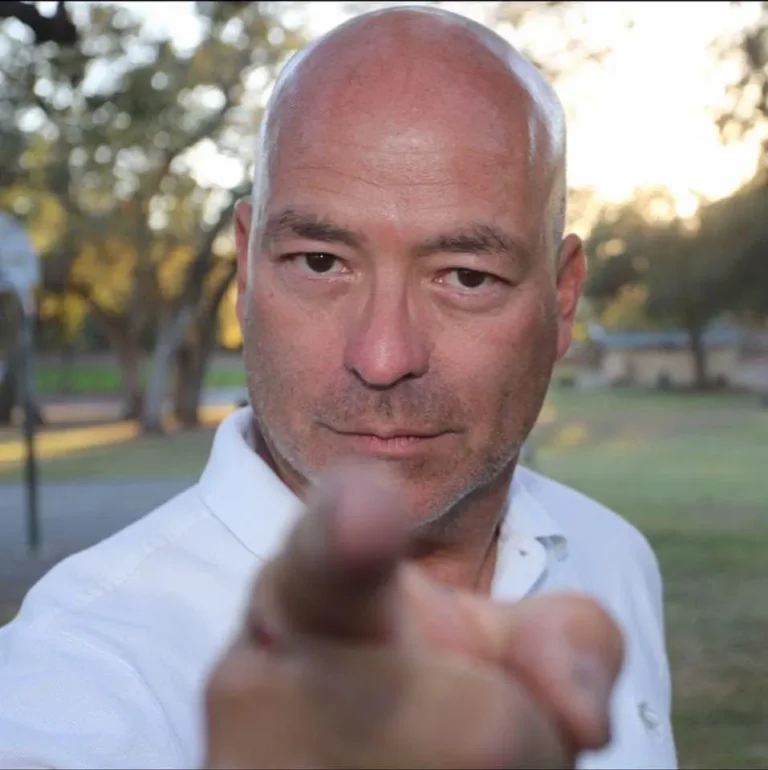 John Stakes of California RV Glass pointing toward the camera