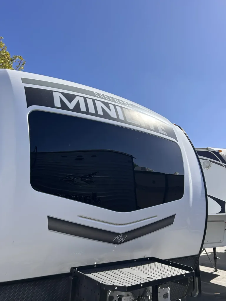 Travel trailer front window glass